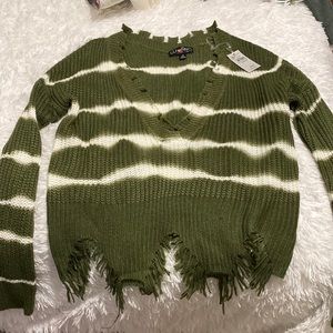 NEVER WORN. Bought from Buckle and never worn. New with tags super cute sweater